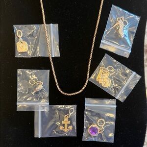 Effy Elegant 24” Gold Necklace with six gold pendant charms.